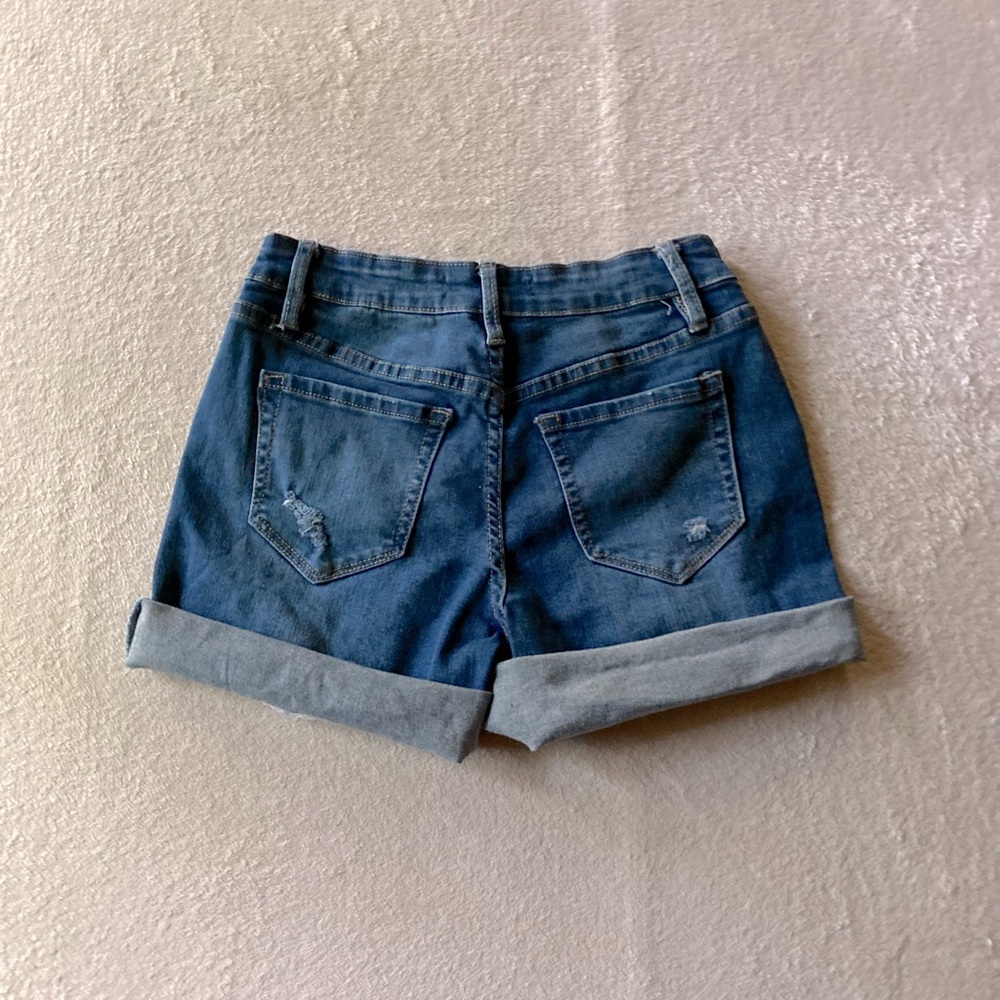 Blue ripped shorts